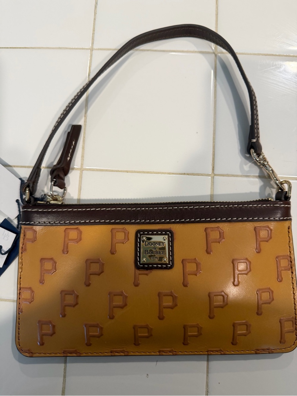 Dooney & Bourke Tan and Brown Embossed Logo Wristlet
